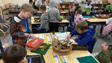 Students working within the classroom