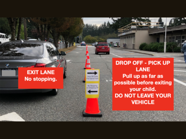 Cars on road with instructions